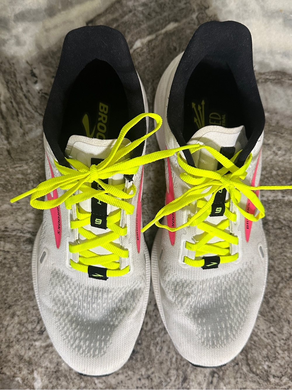 Brooks White Running Shoes with Neon Yellow Laces and Pink Accents